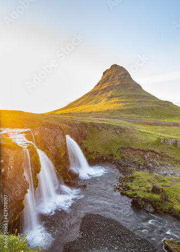 Kirkjufellsfoss waterfall and the Kirkjufell mountain   sunset at Kirkjufell  iceland  snaefellsnes  iceland