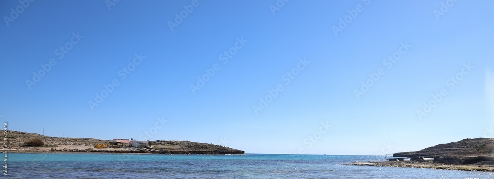 Sea and mountains under clear blue sky., ayia napa