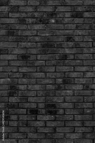 Black brick building wall. Interior of a modern loft. Background for design