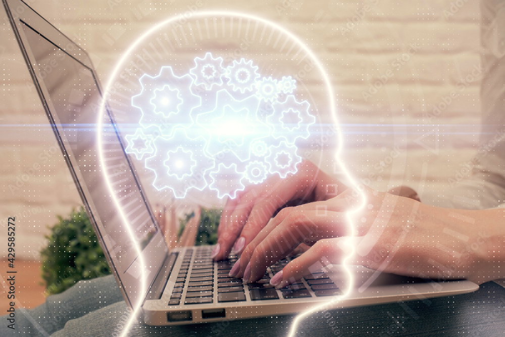 Multi exposure of woman hands working on computer and brain hologram drawing. Ai concept. Multi exposure of woman hands working on computer and brain hologram drawing. Ai concept.