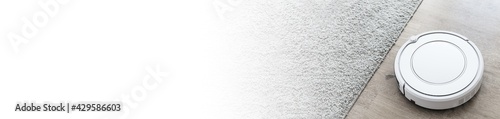 Quadro su tela Robot vacuum cleaner cleaning floor