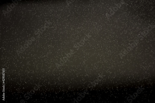 defocused raindrops. Snowflakes on a dark background. Overlay to apply to a photo. abstract background