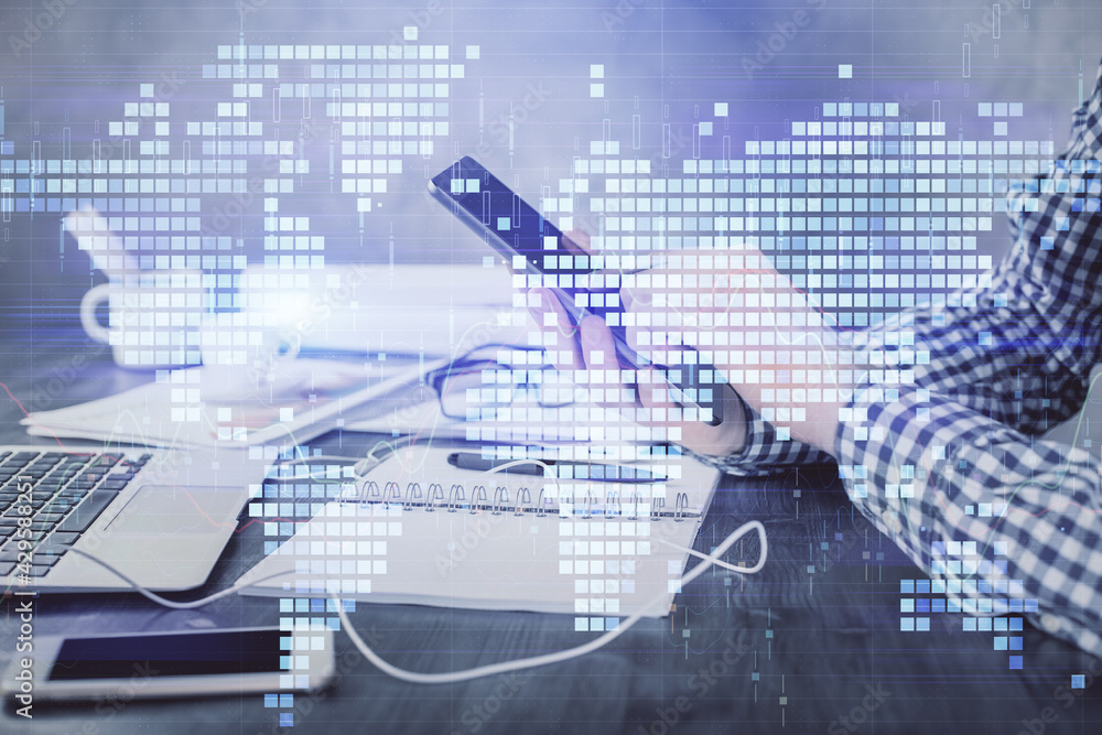 Double exposure of man's hands holding and using a phone and international business theme drawing. Double exposure of man's hands holding and using a phone and international business theme drawing.