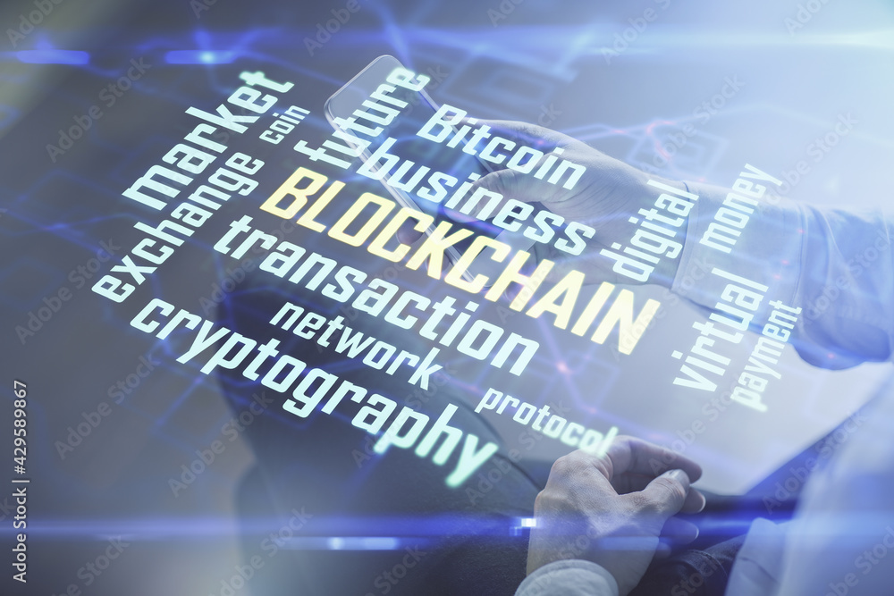 Double exposure of man's hands holding and using a phone and crypto currency blockchain theme drawing. Double exposure of man's hands holding and using a phone and crypto currency blockchain theme drawing.