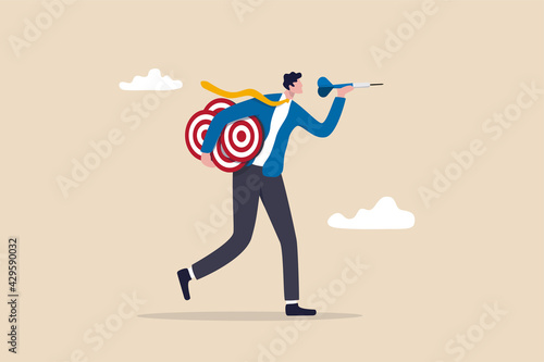 Handle multiple businesses simultaneously, multi purpose or multitasking, side hustle or side job concept, confident businessman carrying many dartboard target.