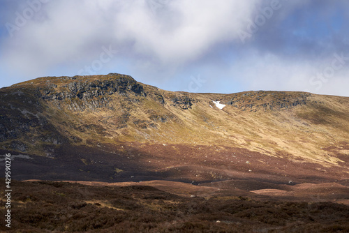The rocky mountain outcrop of Cam Chreag in the winter Scottish Highlands, UK Landscapes.