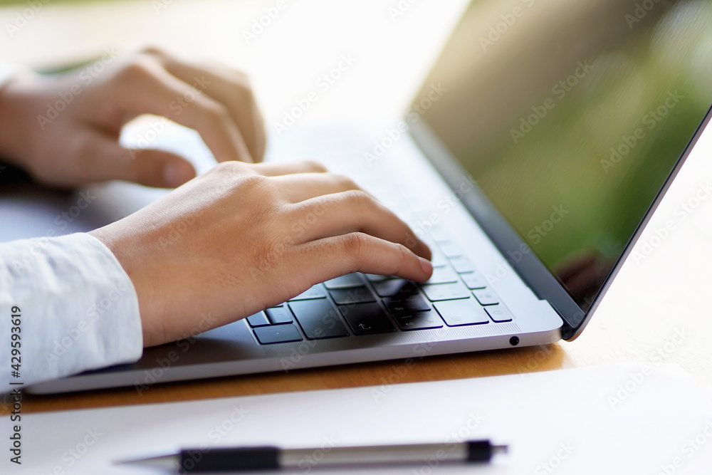 hand woman typing on laptop for search working in office hand woman typing on laptop for search working in office