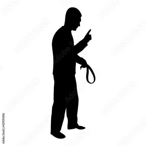 Silhouette angry man with belt in hand for punishment warns showing index finger violence in family concept abuse idea domestic trouble fury male threatening victim social problem husband father