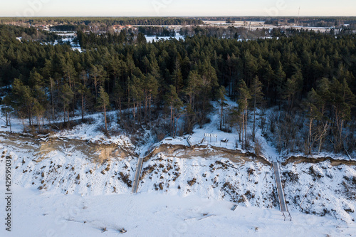 Aerial view of the steep shore of the Baltic Sea in Jurkalne in winter, Latvia.