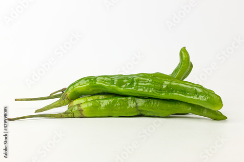 Crumpled red pepper on a white background