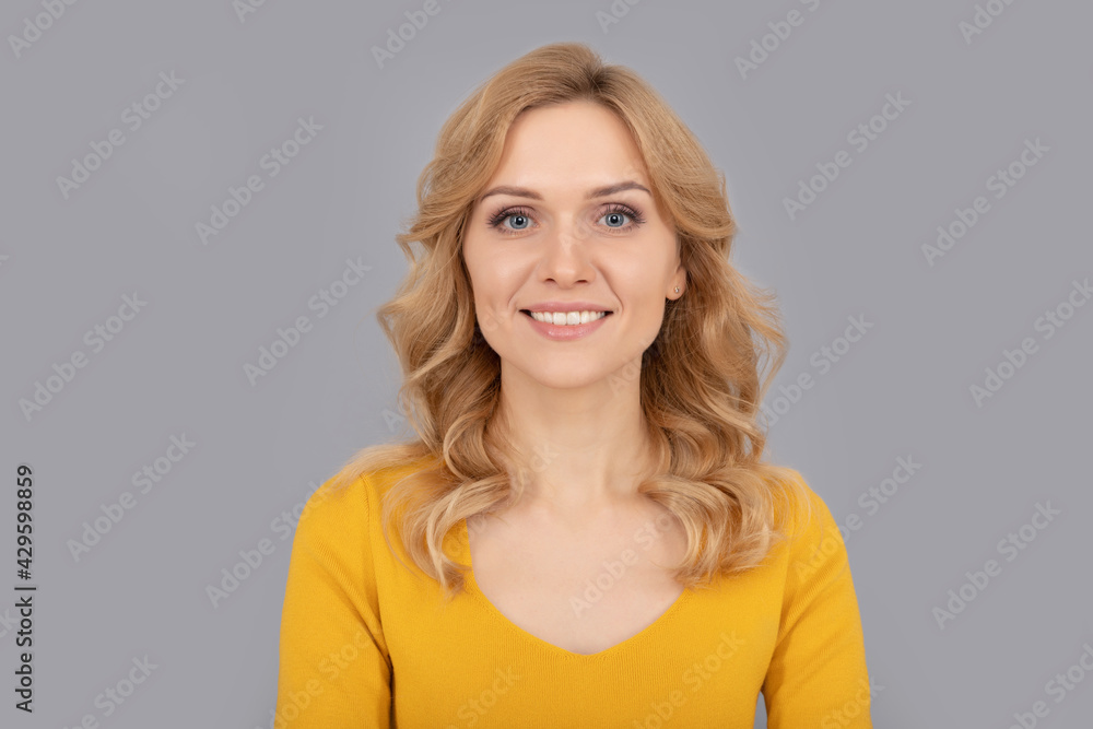nice smile. smooth face skin. cheerful lady with curly hair. fashion and beauty. nice smile. smooth face skin. cheerful lady with curly hair. fashion and beauty.