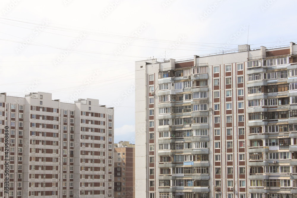 residential multi-storey panel houses in russia in zelenograd against the background of the sky view from the window