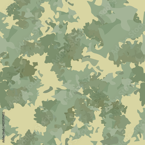 Forest camouflage of various shades of green and beige colors