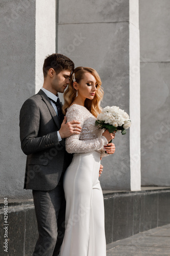 Blonde bride with her husband