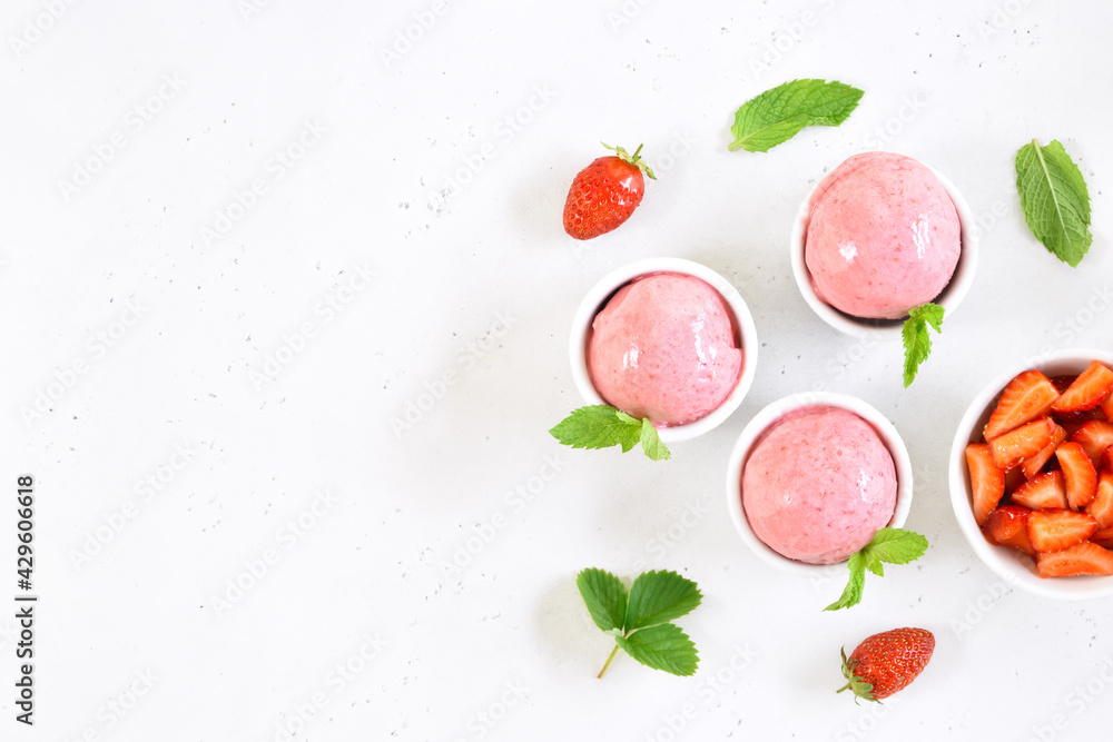 Strawberry ice cream scoop in bowl Strawberry ice cream scoop in bowl