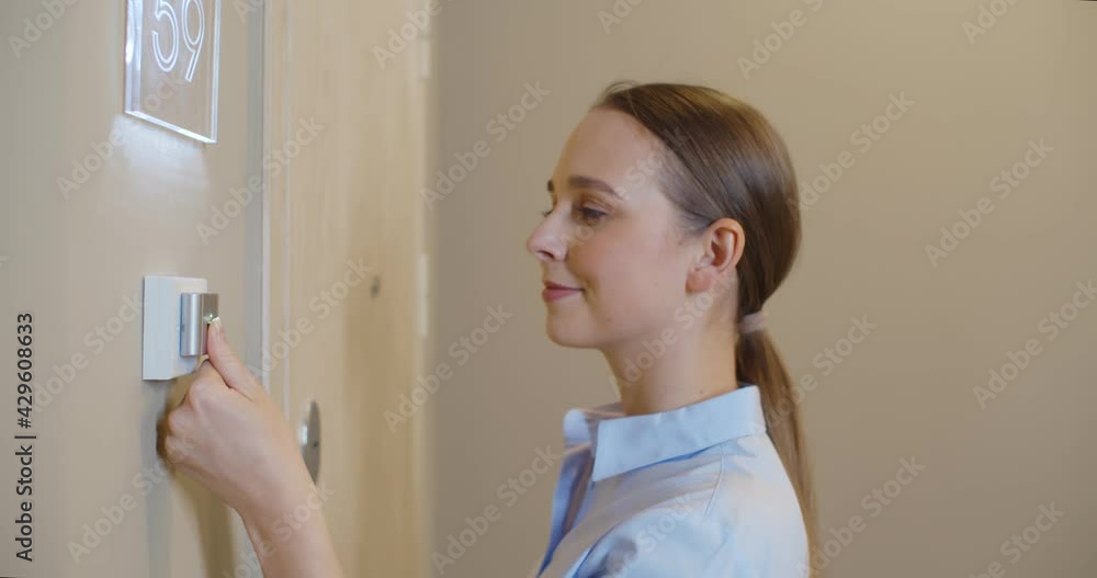 Young woman scan fingerprint on finger scan machine for office door opener Young woman scan fingerprint on finger scan machine for office door opener