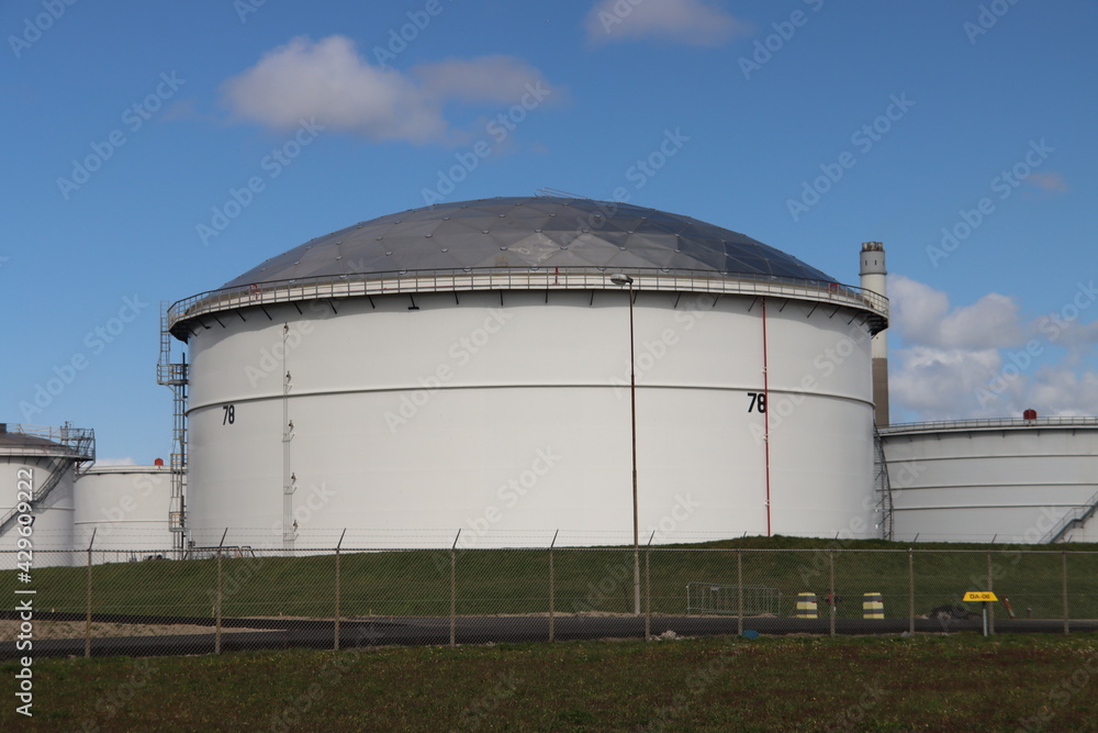 Oil tanks for storage in the Europoort Harbor in the port of Rotterdam at BP Rotterdam Refinery Oil tanks for storage in the Europoort Harbor in the port of Rotterdam at BP Rotterdam Refinery