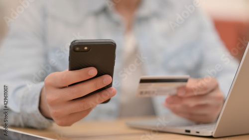 Online Shopping on Smartphone by Male Hands, Close up