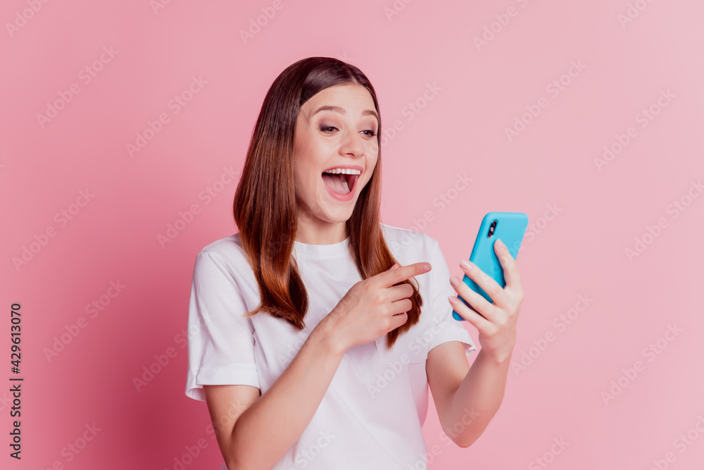 Photo of girl use cellphone direct screen finger excited emotion Photo of girl use cellphone direct screen finger excited emotion