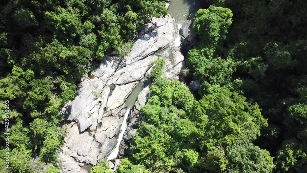 Drone flight over the Than Sadet Waterfall in the national park of Koh Phangan Drone flight over the Than Sadet Waterfall in the national park of Koh Phangan