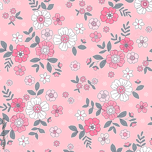 Seamless floral pattern. Ditsy background of small white and bright pink flowers. Small-scale flowers scattered over a pink background. Stock vector for printing on surfaces and web design.