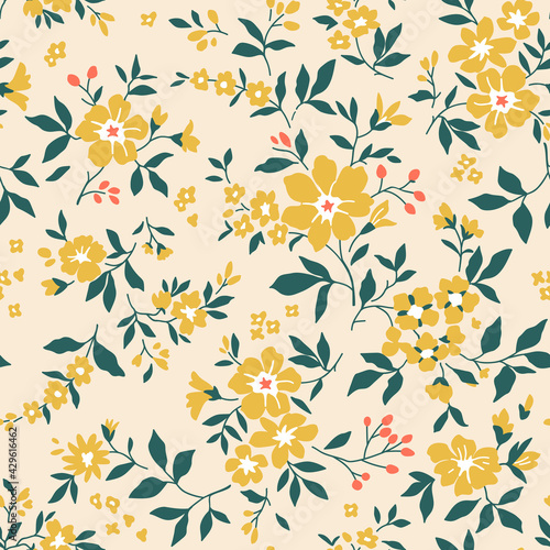 Cute floral pattern in the small flower. Seamless vector texture. Elegant template for fashion prints. Printing with small pale yellow flowers. Light beige background. Stock print.