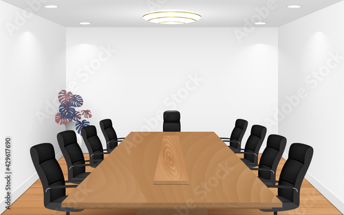 wooden conference table and chairs in the white room
