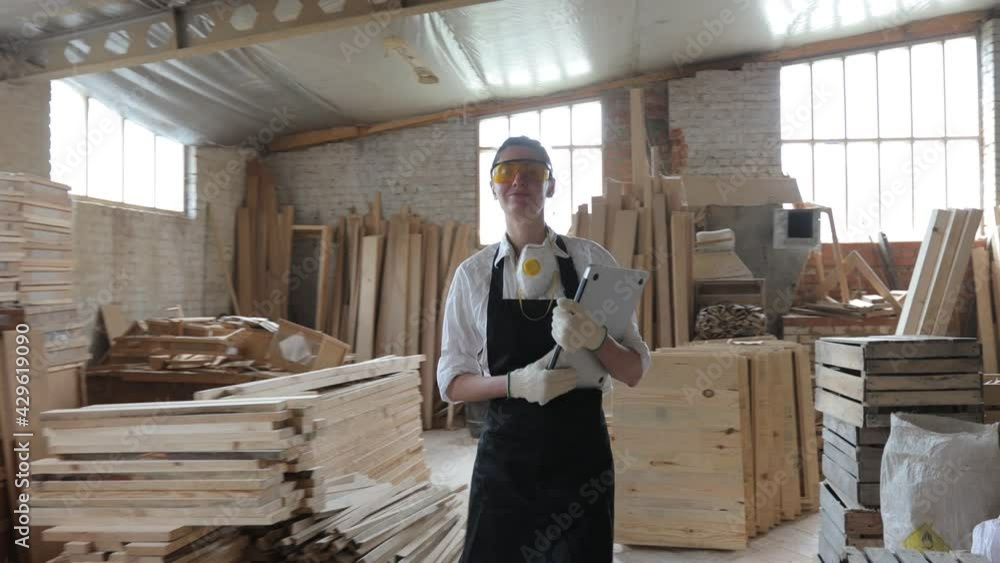 Carpenter woman working in her own woodshop Carpenter woman working in her own woodshop