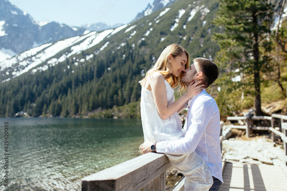 Young couple has a love story in the mountains. Young couple has a love story in the mountains.