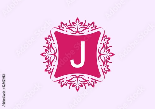 Pink vintage frame with J initial letter in the middle