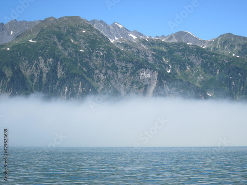 Fog Bank over the Ocean with a Mountain Above Near Valdez  Alaska