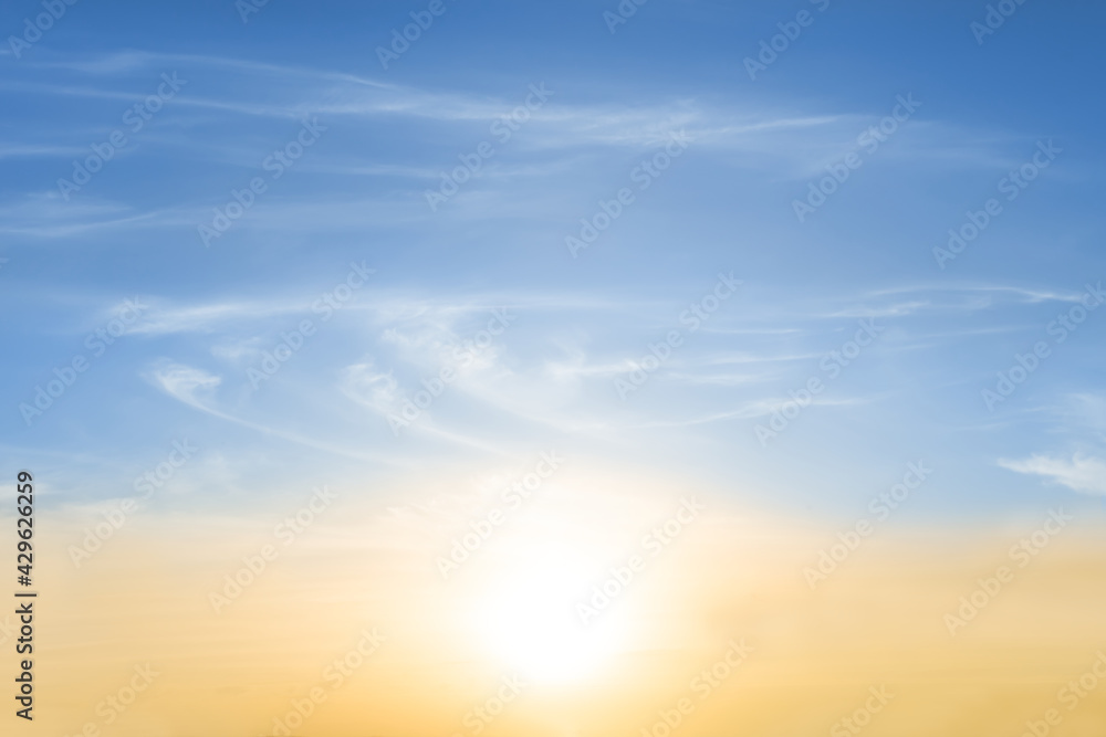 sparkle sun on evening blue cloudy sky, natural sunset background sparkle sun on evening blue cloudy sky, natural sunset background