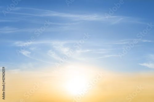 sparkle sun on evening blue cloudy sky, natural sunset background