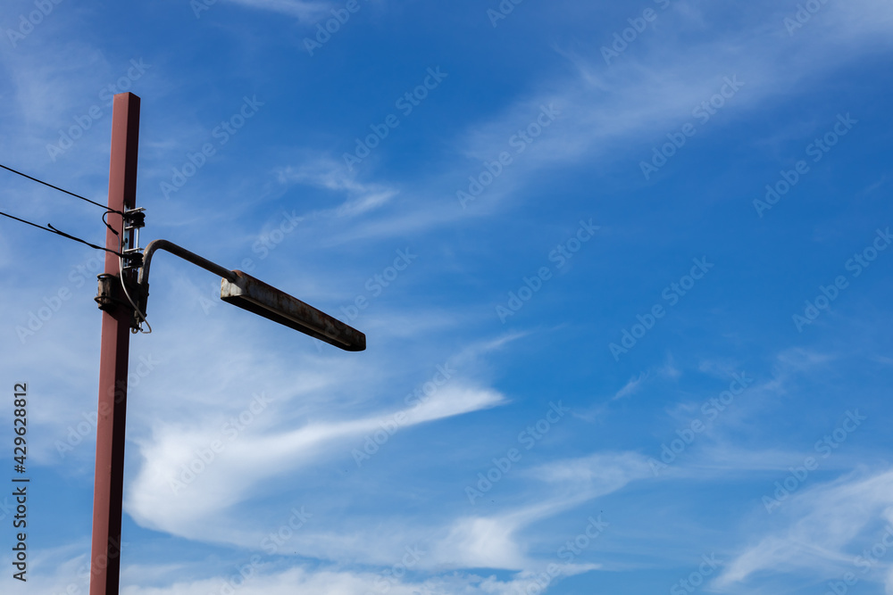 Light pole in the middle of the sky. Copy space. Light pole in the middle of the sky. Copy space.
