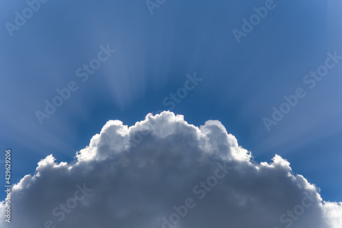 sun rays push through the gense cumulus clouds, natural concept sky background