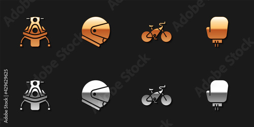 Set Snowmobile, Helmet, Bicycle and Boxing glove icon. Vector