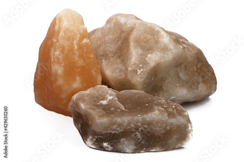 Tableau sur toile three large pieces of natural salt on a white isolated background