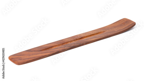 wooden stand for incense sticks on a white isolated background