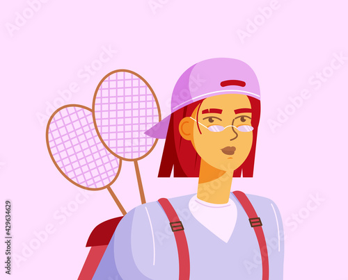 Active lifestyle concept. Young red haired girl in a pink cap is going to play badminton
