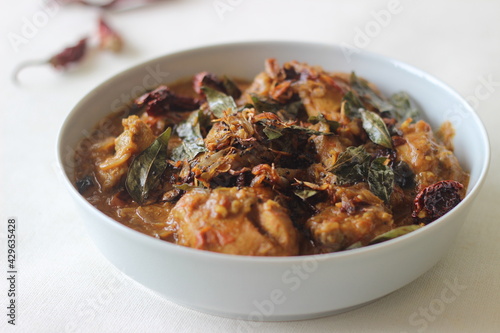 Kerala style chicken curry made with home ground masala.