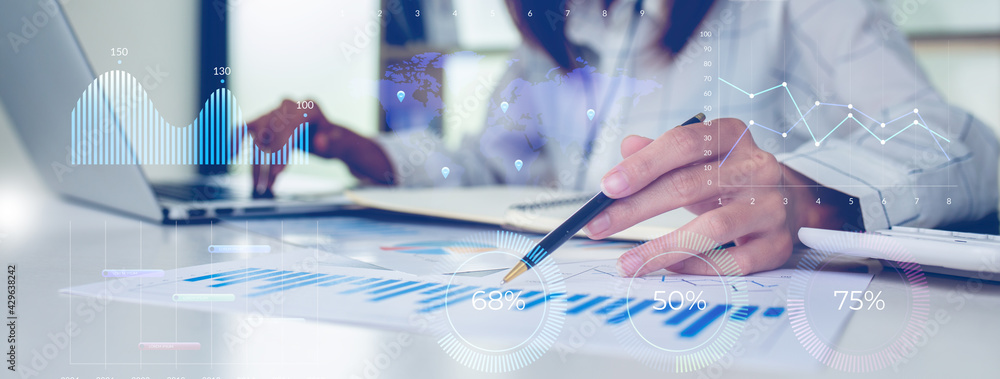 Obraz premium Financial Businesswomen analyze the graph of the company's performance to create profits and growth, Market research reports and income statistics, Financial and Accounting concept.