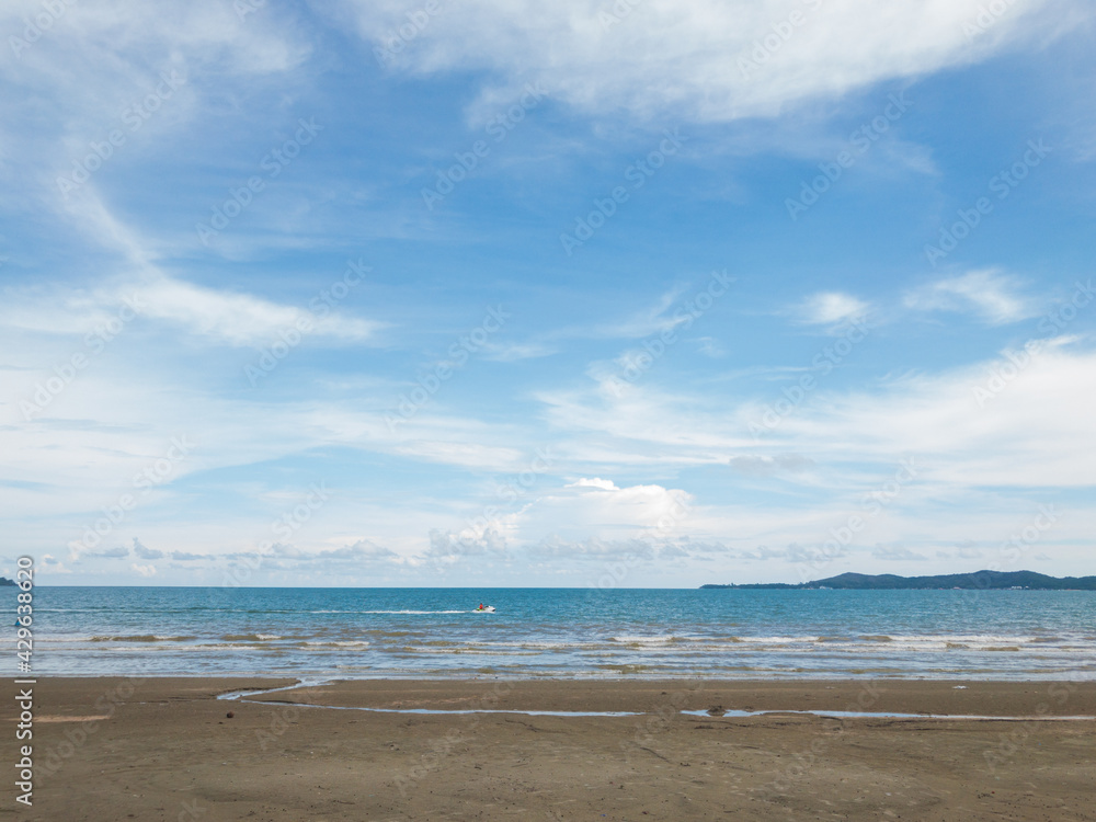 Sandy beaches and seas with soft white clouds, blue skies, Thailand's summer beaches. Sandy beaches and seas with soft white clouds, blue skies, Thailand's summer beaches.