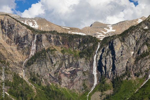 Waterfalls at Avalanche Lake and surrounding mountain range at Glacier National Park