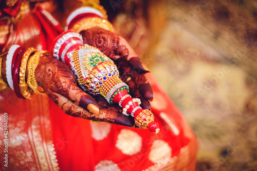 Indian bride with her sindur pot in her hand photo