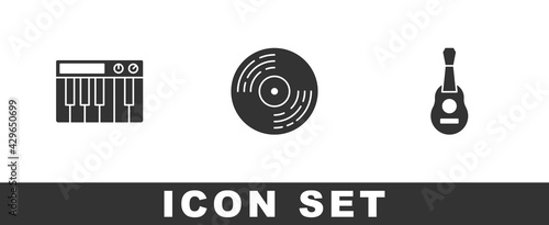 Set Music synthesizer, Vinyl disk and Guitar icon. Vector