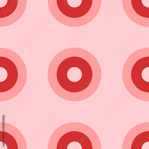 Seamless pattern of large isolated red record media symbols. The elements are evenly spaced. Vector illustration on light red background