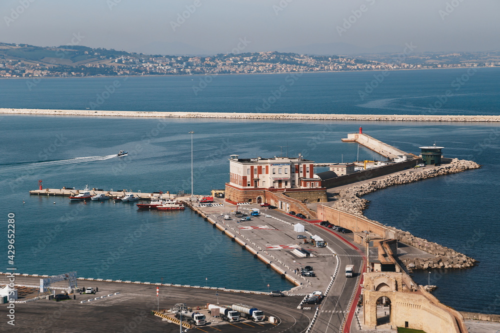 Aerial view of port of Ancona, Coast Guard building and the Red Lighthouse. Bright summer day, travel concept