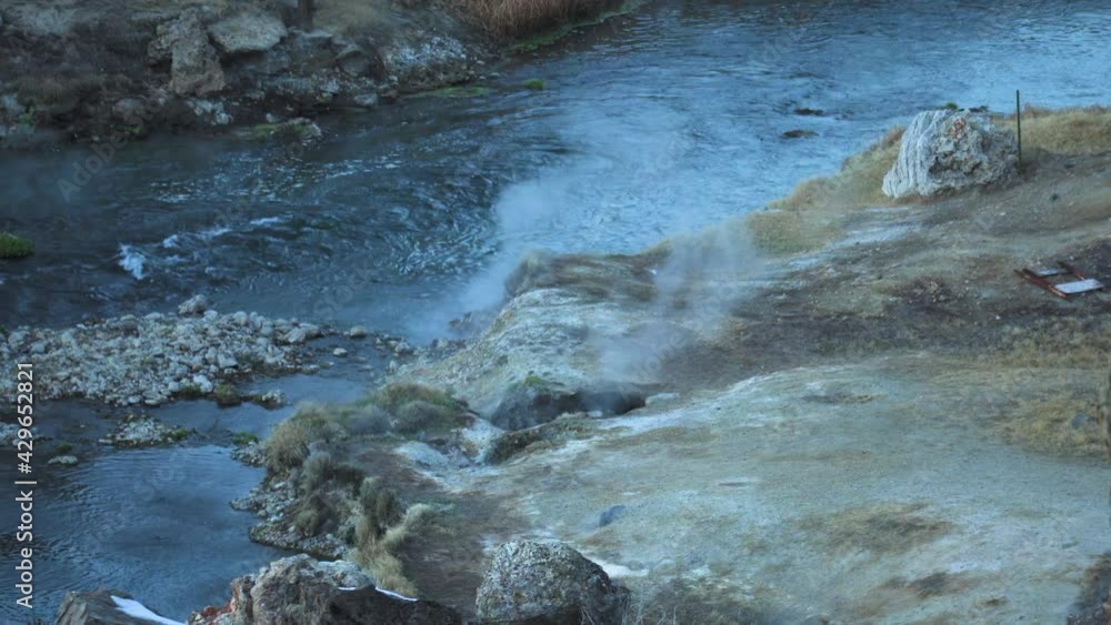 Hot Steam Along Water Stream at Hot Creek Geological Site, Inyo National Forest, Slow Motion, High Angle Hot Steam Along Water Stream at Hot Creek Geological Site, Inyo National Forest, Slow Motion, High Angle