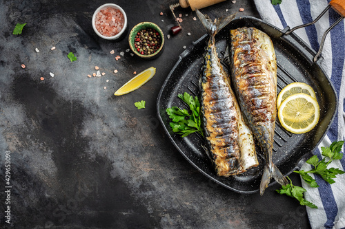 Grilled mackerel with lemon herbs and spices, banner, menu recipe place for text, top view