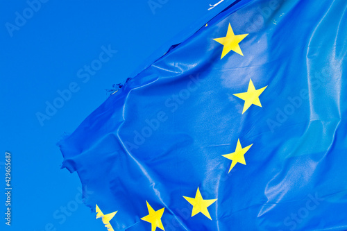 Frayed European flag - concept image with copy space